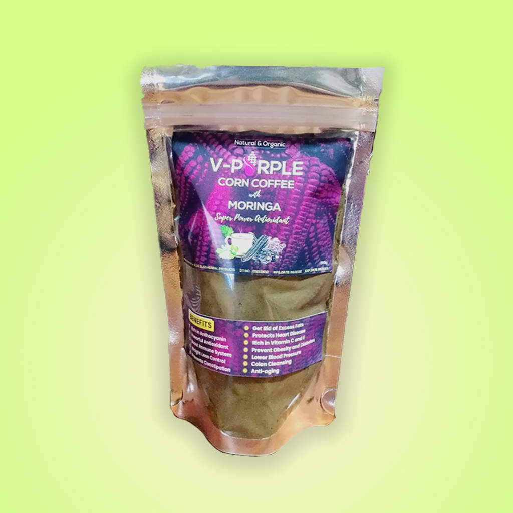 A pouch of V-Purple Corn Coffee in a gradient green background.